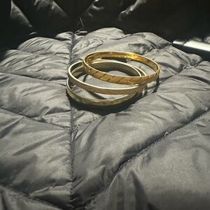Monet Bangles: Smooth gold plated and two texturized